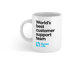 A white coffee mug that reads 'World’s best customer support team, Haven Life'